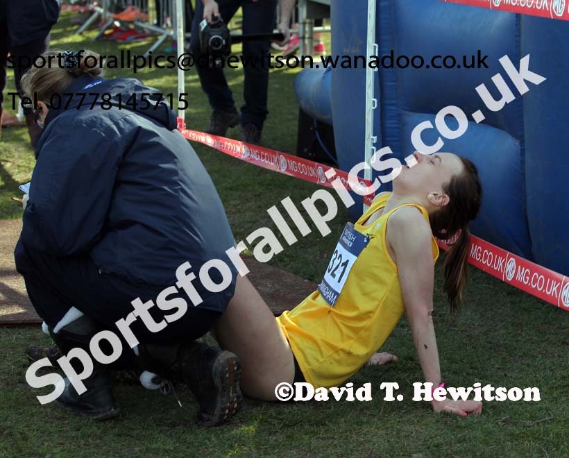 An exhausted Lily Partridge (Surrey) after winning the Senior Womens Inter Counties Cross Country,  Cofton Park, Birmingham. Photo: David T. Hewitson/Sports for All Pics